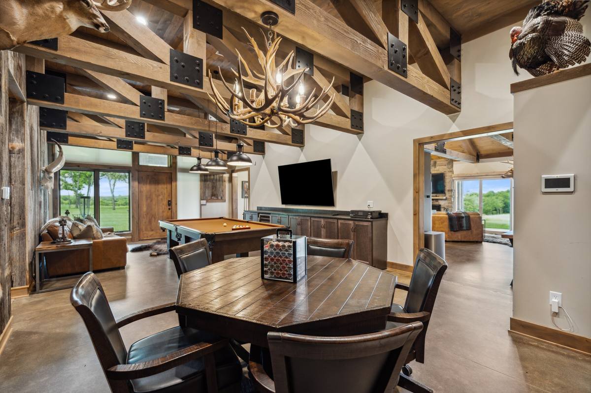 Poker table with antler chandelier